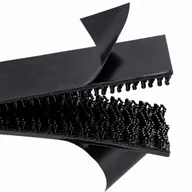 Close-up of the Dual-Lock strips' mushroom-shaped heads, with the adhesive liner peeled back