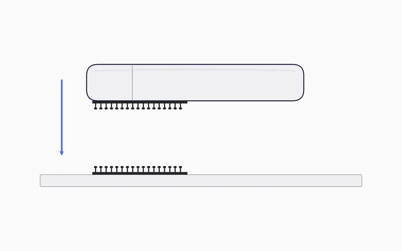 The tracker lowered onto the fixed strip, with the two strips snapping into each other