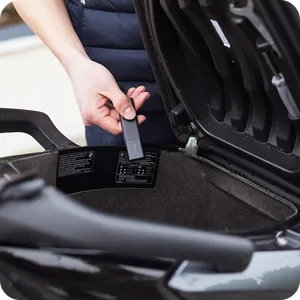 A Classic GPS Tracker stored in the trunk of a scooter